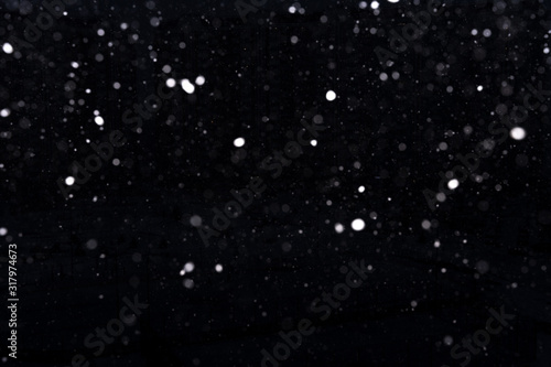 snow on a black background. snow texture