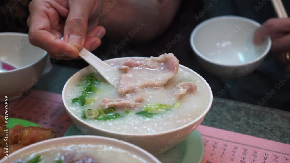 Cantonese congee boiled rice pork soup morning hot meal Cantonese congee boiled rice pork soup morning hot meal