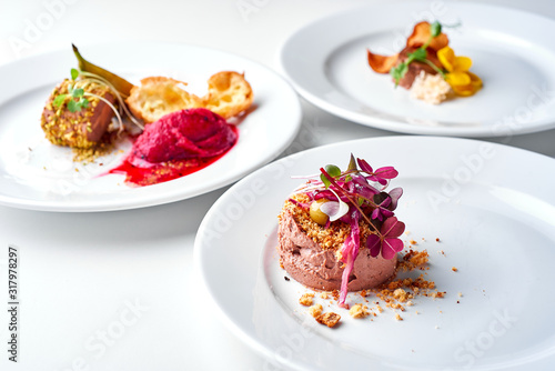 Set Food Menu On A White Plate. Top view of light dish perfect served. Meat pate on a plate