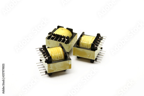 Switch mode power transformer isolated on white. Electronic components.