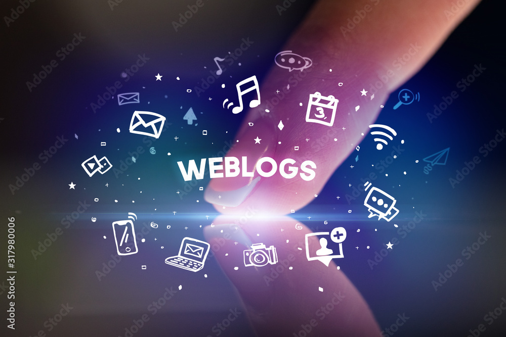 Finger touching tablet with drawn social media icons and WEBLOGS inscription, social networking concept Finger touching tablet with drawn social media icons and WEBLOGS inscription, social networking concept