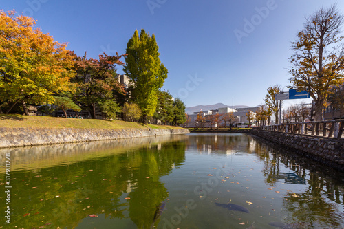 Matsumoto castle entry ditch, a designated National Treasure of Japan, and the oldest castle donjon remaining in Japan. Construction began in 1592 and it is also known as Crow Castle, Japan.