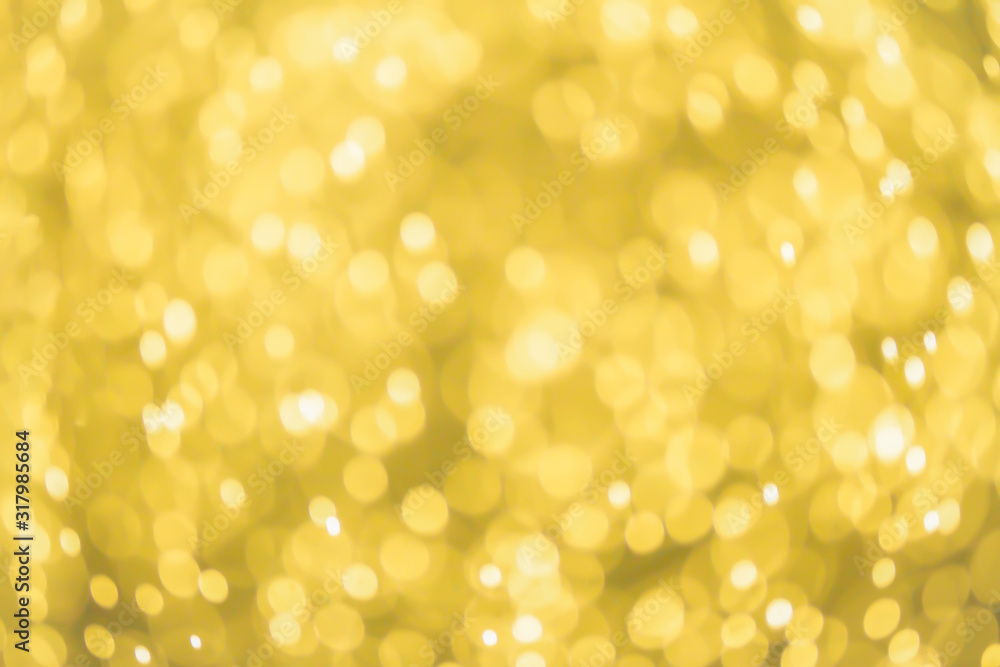 Abstract golden bokeh of blurry lights background.