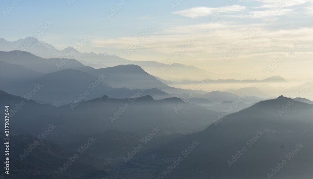 mountains range  in fog winter season sarankot nepal
