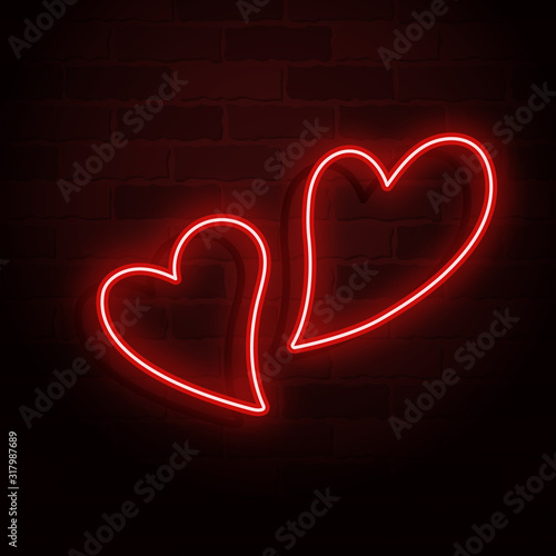 Two different glowing neon hearts on a brick wall for Valentines day card design. Vector illustration.