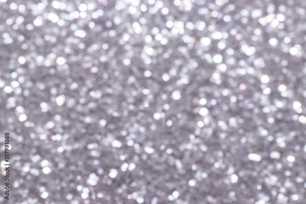 Silver glitter festive background with bokeh lights. Celebration concept for Holidays and anniversary.