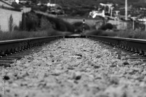 Old train track in black and white photo
