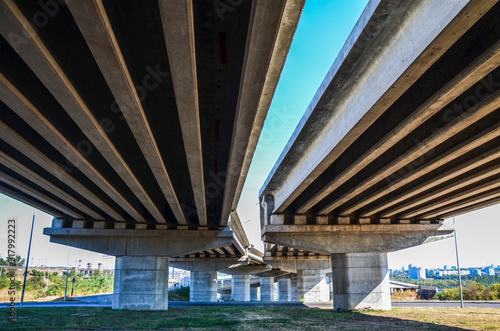 Fototapeta Concrete structure overpass of express way use for infrastructure and public con