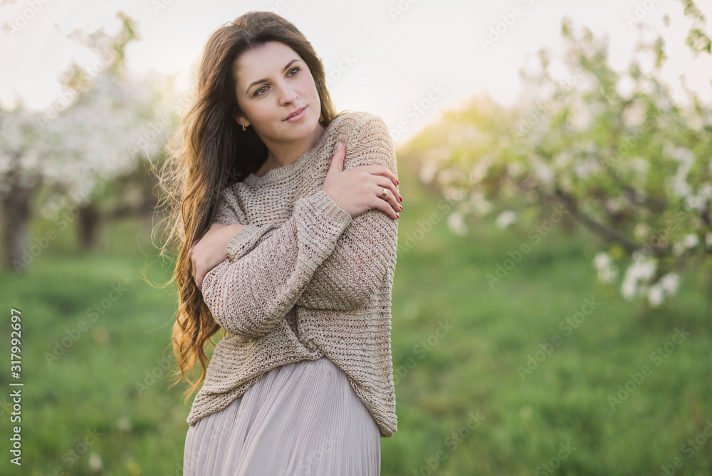 Long hair girl in blooming garden closeup portrait Long hair girl in blooming garden closeup portrait