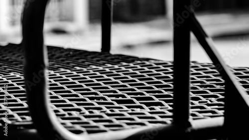 Black metal sieve, oblique stripes, for carrying heavy things