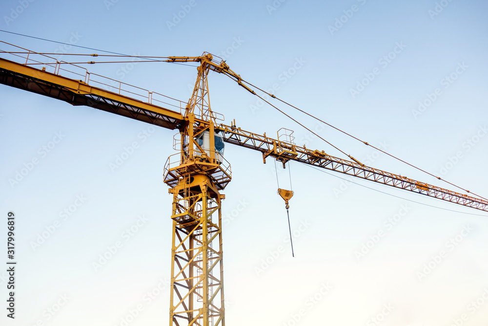 yellow crane with blue sky as background yellow crane with blue sky as background