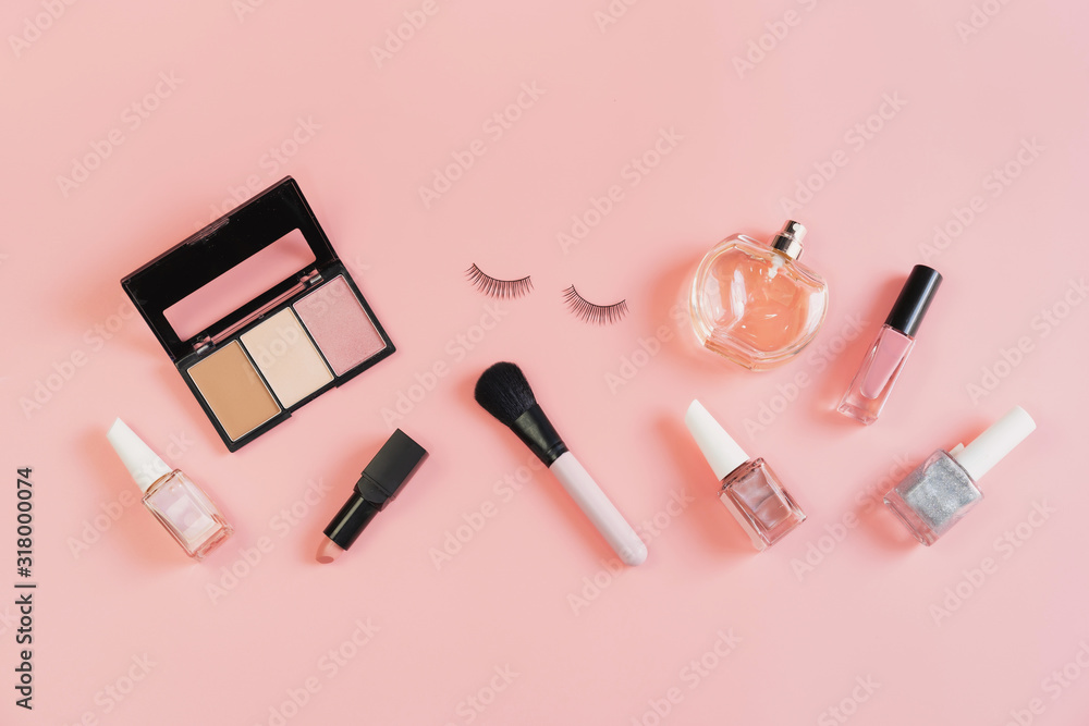Obraz premium Woman cosmetics and make up on pink background, Top view
