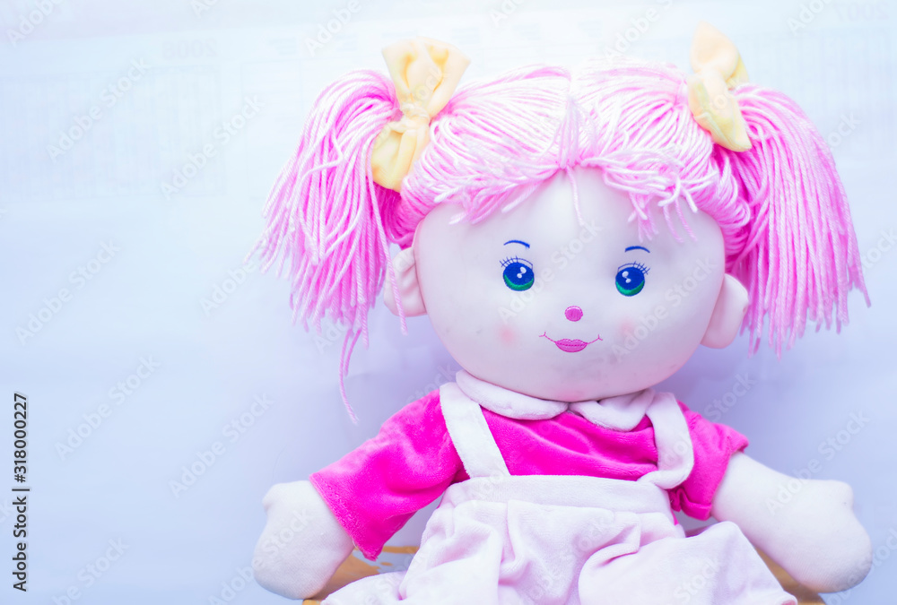 Soft toy - doll from close up on white background