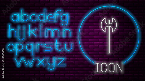 Glowing neon line Medieval axe icon isolated on brick wall background. Battle axe, executioner axe. Medieval weapon. Neon light alphabet. Vector Illustration
