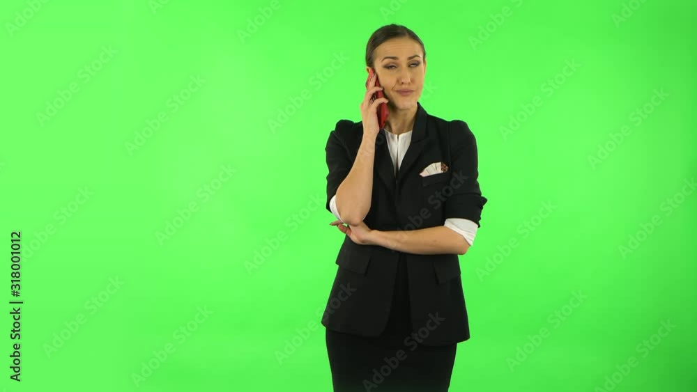 Girl angrily speaks on the phone, proves something. Green screen Girl angrily speaks on the phone, proves something. Green screen