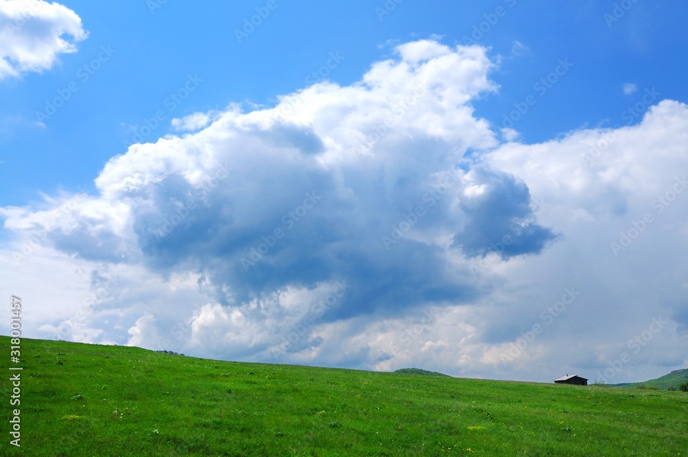 Mountain landscape and small village in distance