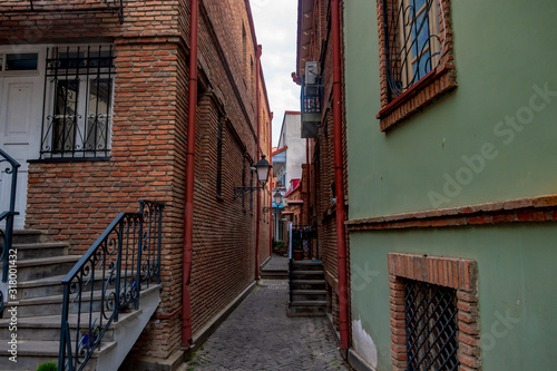 Narrow street in the old city of Tbilisi. Narrow passage between houses