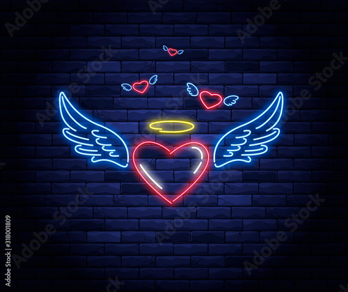 Illuminated neon heart with angel wings and halo