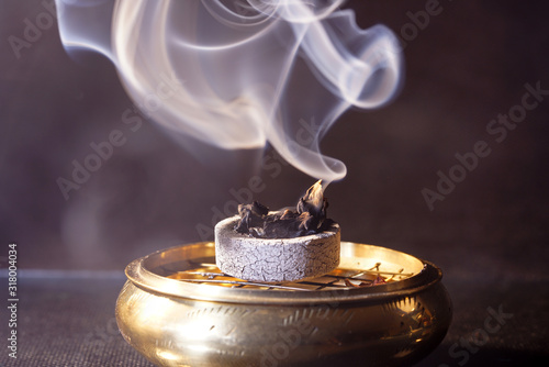 Smoke flashed with colorful foils and photographed in the studio