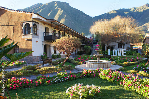 The  beautiful gardens and grounds at a hotel located in the Sacred Valley in Pe Fototapet