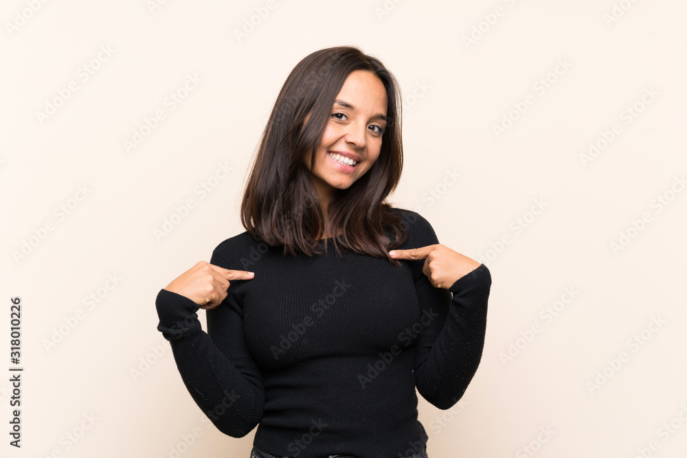Young brunette woman with white sweater over isolated background proud and self-satisfied Young brunette woman with white sweater over isolated background proud and self-satisfied