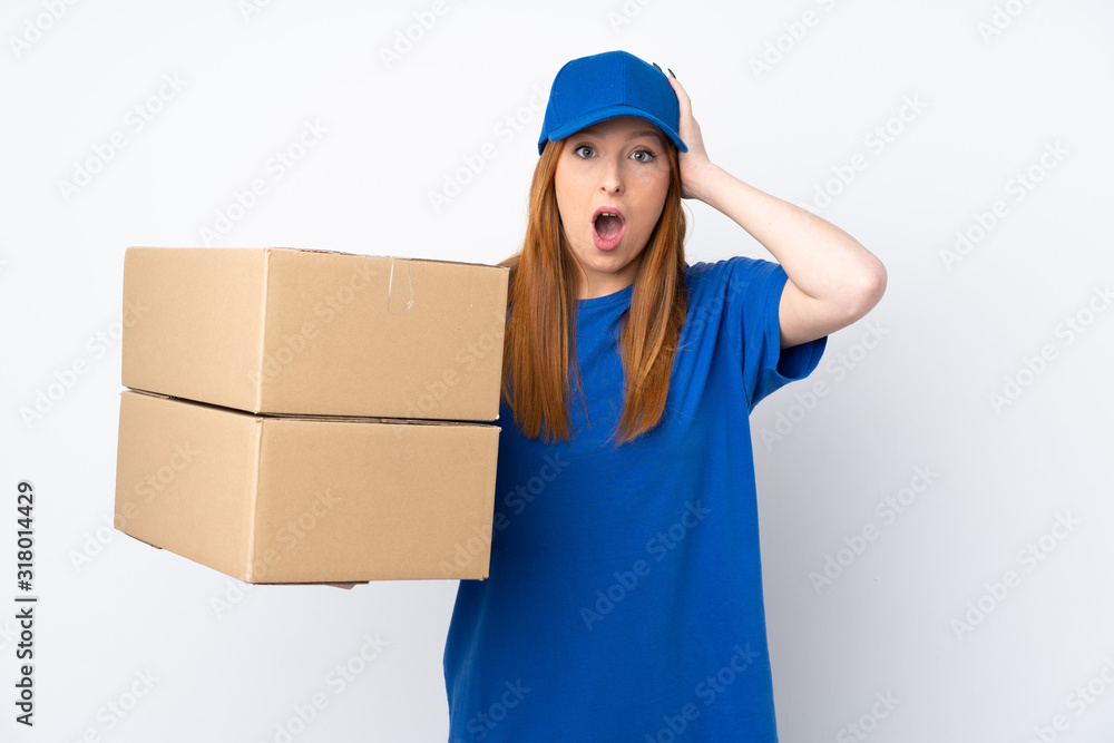 Young delivery woman over isolated white background with surprise facial expression Young delivery woman over isolated white background with surprise facial expression