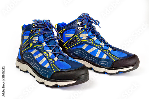 Warm men's sports-style boots with a waterproof surface, with laces