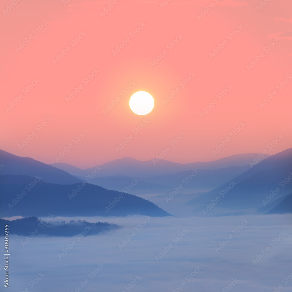 mountain valley in a clouds at the early morning, mountain sunrise background