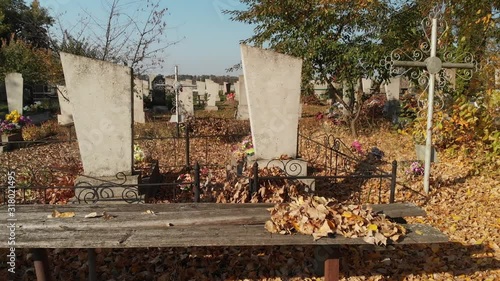 Old Tombs On The Cemetery.Cemetery on the Outskirts of the Village.Aerial View Of A Cemetery.Iron Cross photo