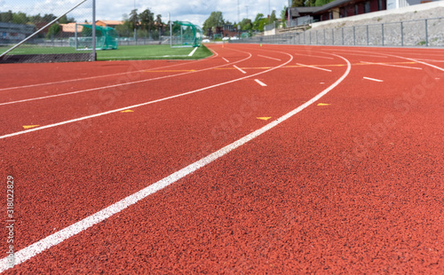 Running track in stadium. Red Running Race track rubber with lines. Stadium Empty Running track background.