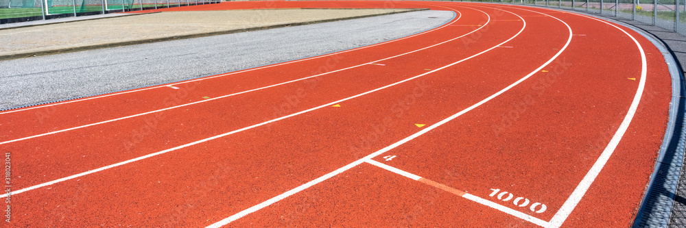 Running track in stadium. Red Running Race track rubber with lines. Stadium Empty Running track background. Header.