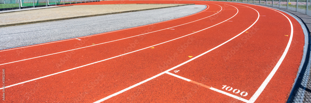 Running track in stadium. Red Running Race track rubber with lines. Stadium Empty Running track background. Header. Running track in stadium. Red Running Race track rubber with lines. Stadium Empty Running track background. Header.