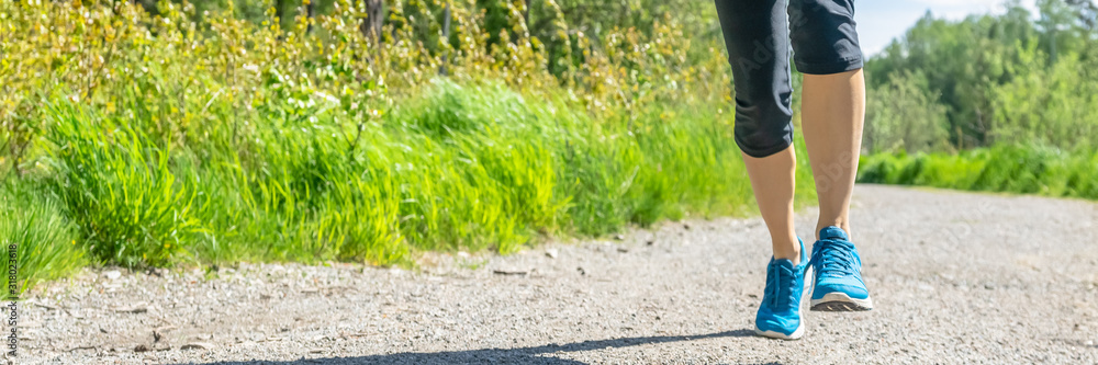 Fitness woman running at forest trail Woman fitness legs. Jogging workout wellness concept. Close up of woman athlete legs in park on sunny day. Workout. Sport Girl running in a forest outfit. Header Fitness woman running at forest trail Woman fitness legs. Jogging workout wellness concept. Close up of woman athlete legs in park on sunny day. Workout. Sport Girl running in a forest outfit. Header