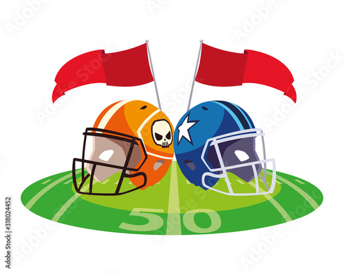 american football helmets on stadium grass