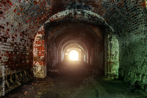 Light at the end of tunnel. Passage in abandoned German fortification