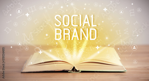 Open book with SOCIAL BRAND inscription, social media concept