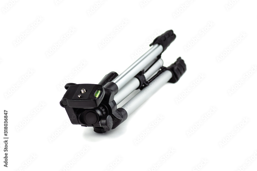 camera tripod, folded, isolated, photographer's tool camera tripod, folded, isolated, photographer's tool