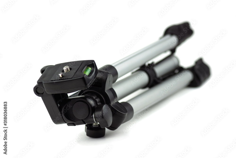 camera tripod, folded, isolated, photographer's tool camera tripod, folded, isolated, photographer's tool