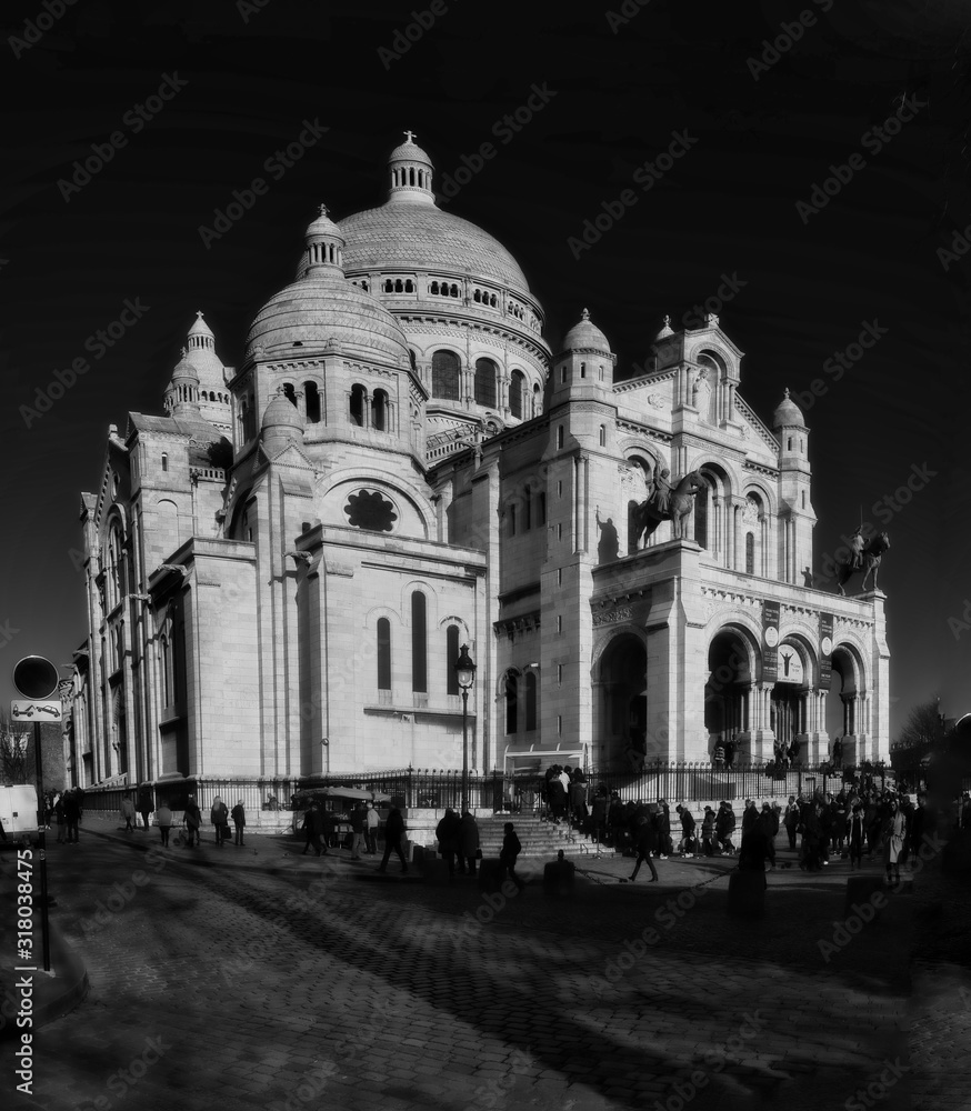 Huge and beautiful sight of Montmartre, Paris, France: the white-domed Basilica of the Sacré-Cœur. in black and white