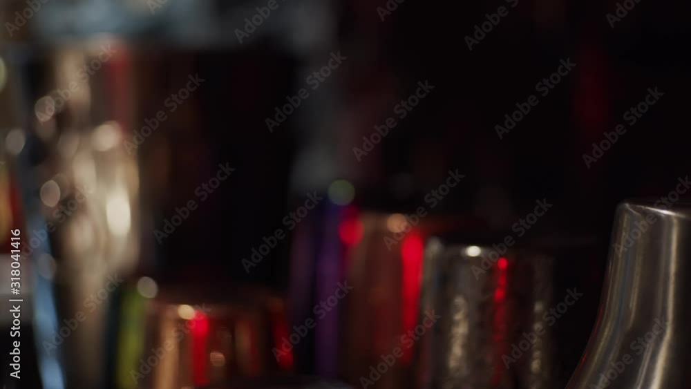 Buckets for ice and cocktail shakers in restaurant, shallow depth of field Buckets for ice and cocktail shakers in restaurant, shallow depth of field