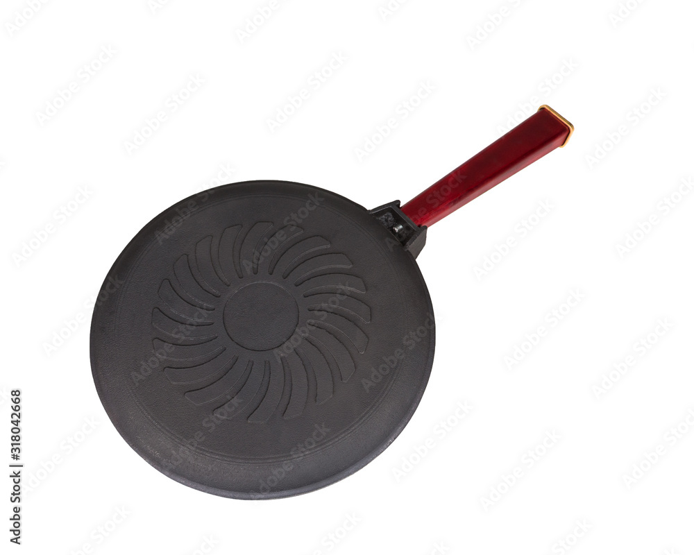 Inverted cast iron frying pan on white background. Inverted cast iron frying pan on white background.