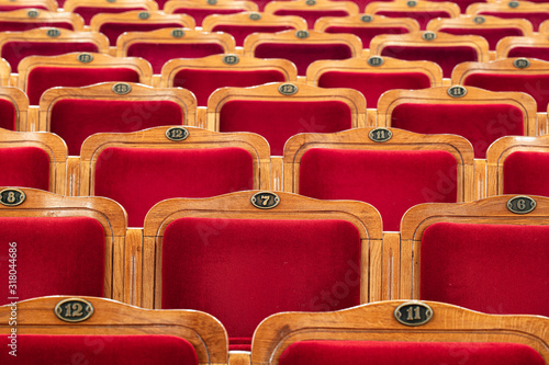 Row of red seats in theatre