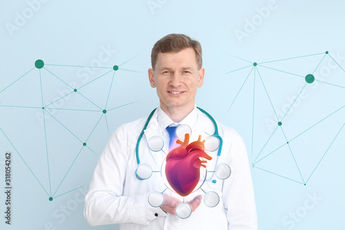 Male cardiologist with draw...