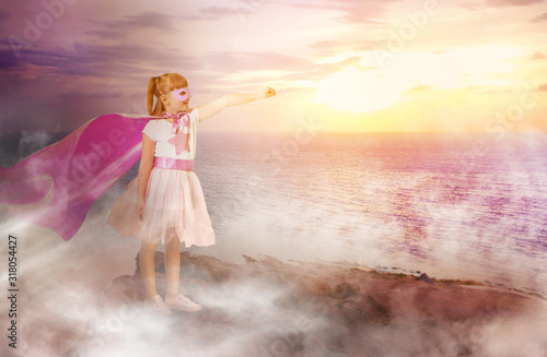 Cute little girl dressed as...