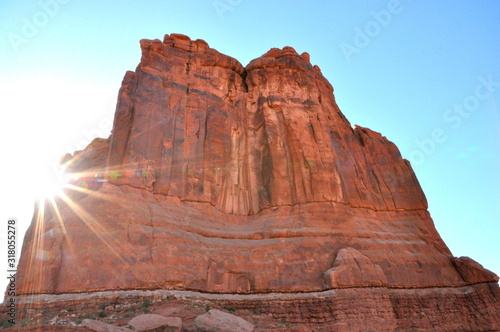 Sunlight by rock formation near Arches National Park, Moab, Utah, U.S.A