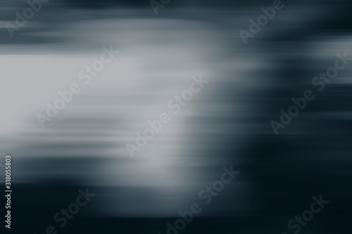 Abstract blurred background in blue tonality light spots and slant lines. Background for design.