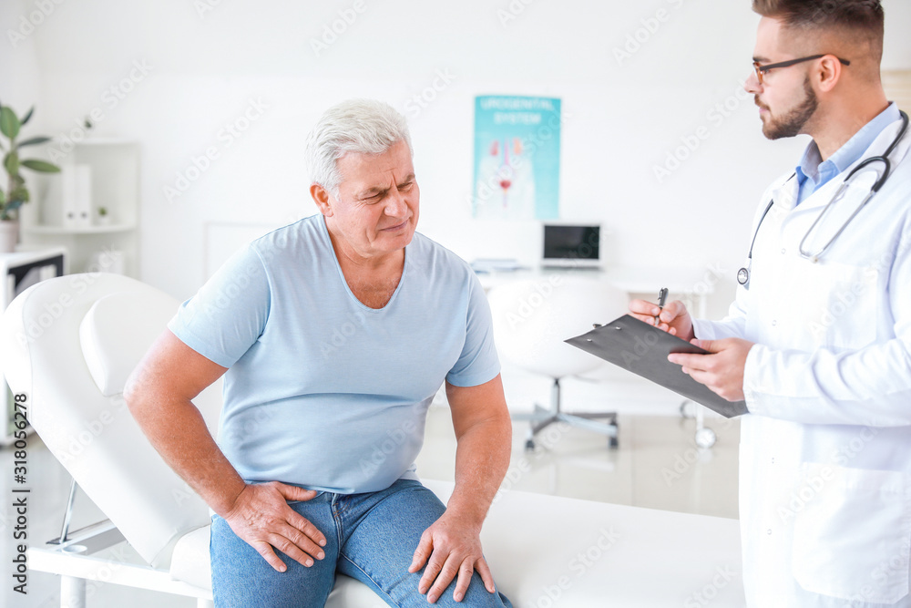 Fototapeta premium Mature man visiting urologist in clinic