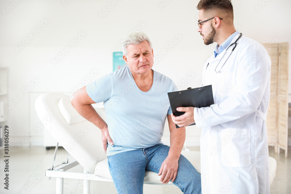 Fototapeta premium Mature man visiting urologist in clinic