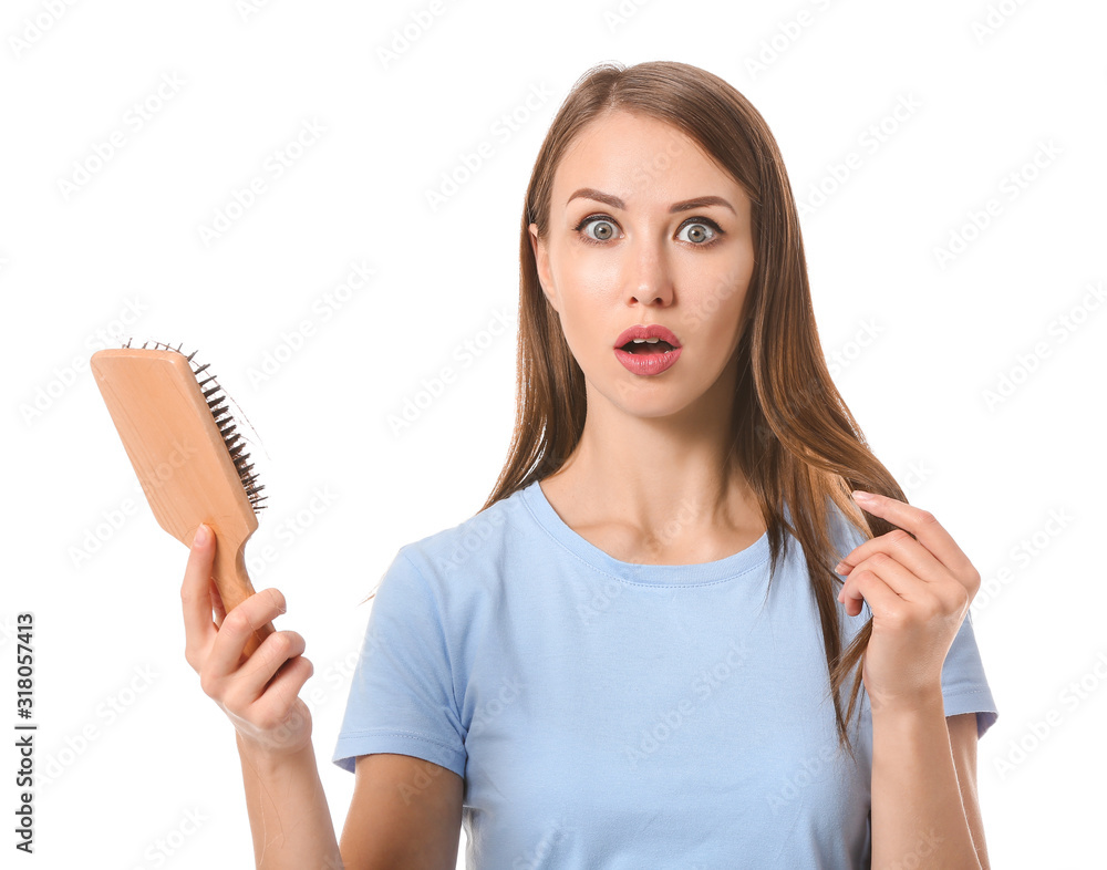 Young woman with hair loss problem on white background Young woman with hair loss problem on white background
