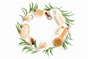 Spa concept with eucalyptus oil and eucalyptus leaf extract natural /organic spa cosmetics products, eco friendly bathroom accessories. Skincare concept on white background. Flat lay composition top v